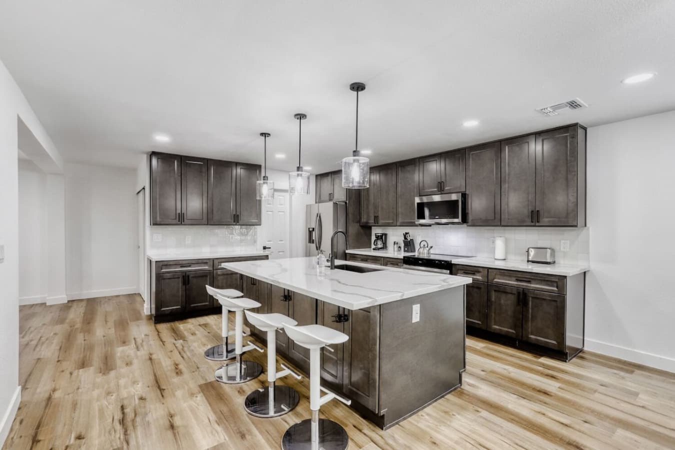 Another view of the open kitchen and living space.