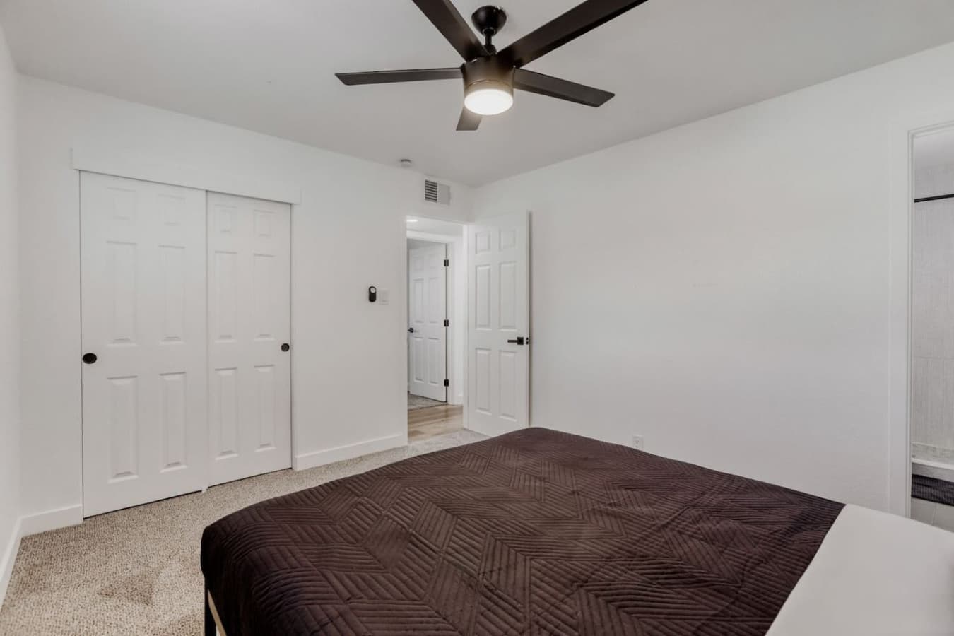 Bedroom with ample space and closet access.