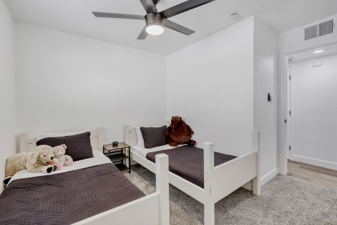 Two twin beds arranged for flexible sleeping.