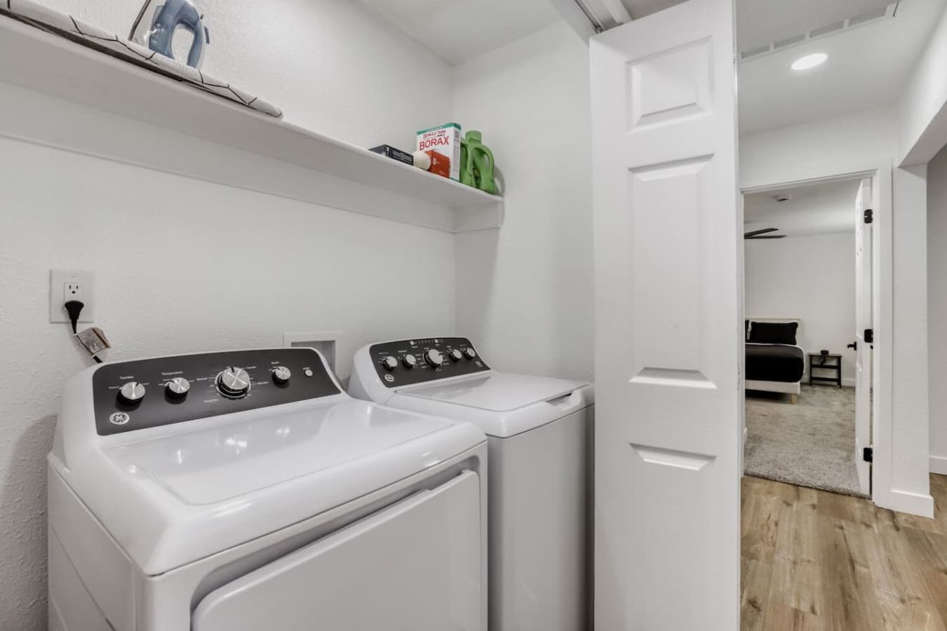Laundry area with washer and dryer.