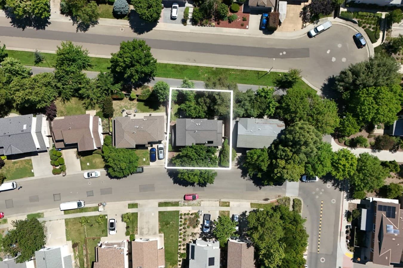 Aerial neighborhood view showing the home’s location within a quiet residential community.
