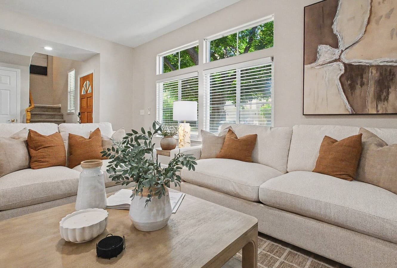 Relaxing lounge space with modern decor and a cozy gathering setup.