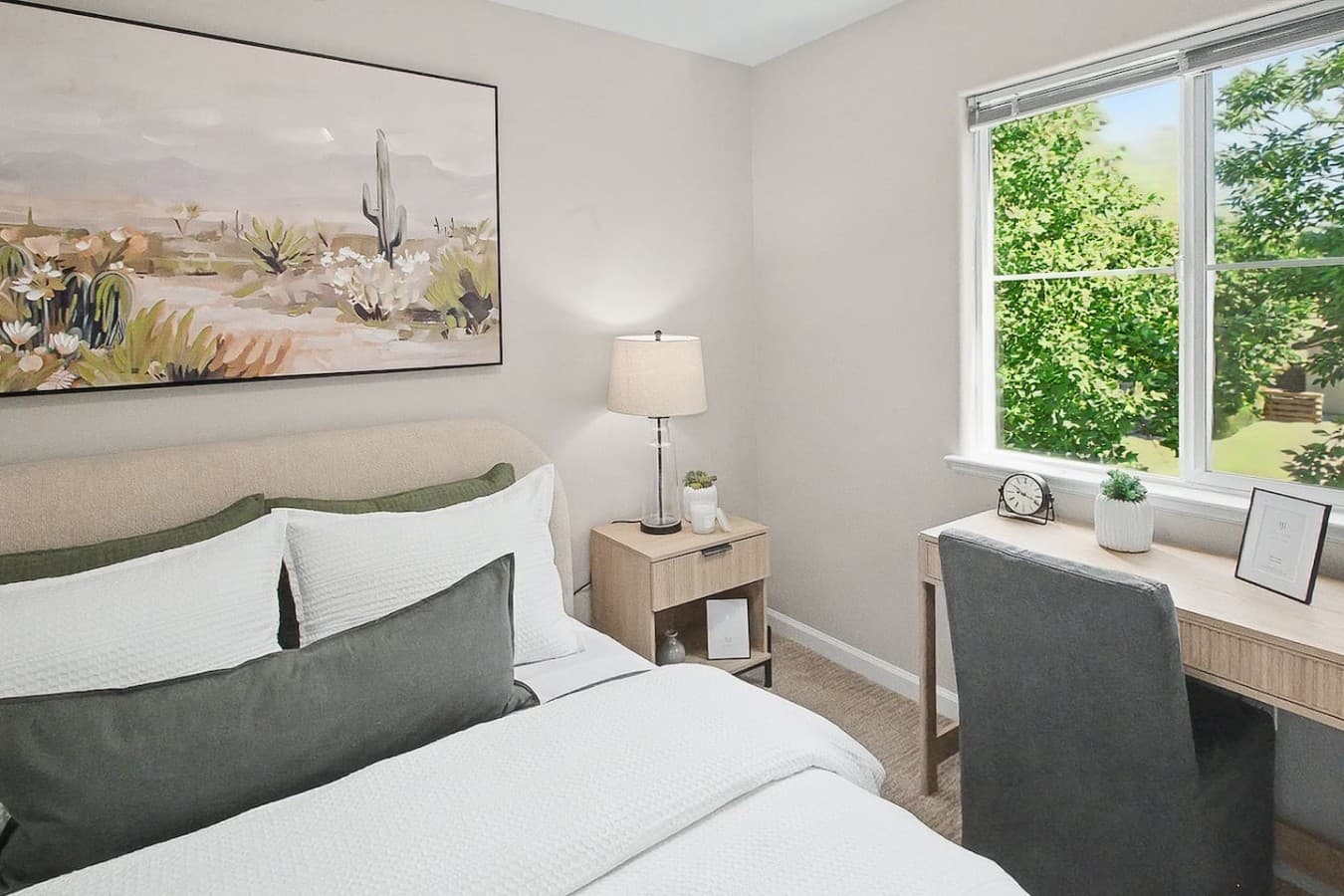 Bright bedroom corner with natural light and a relaxing minimalist design.