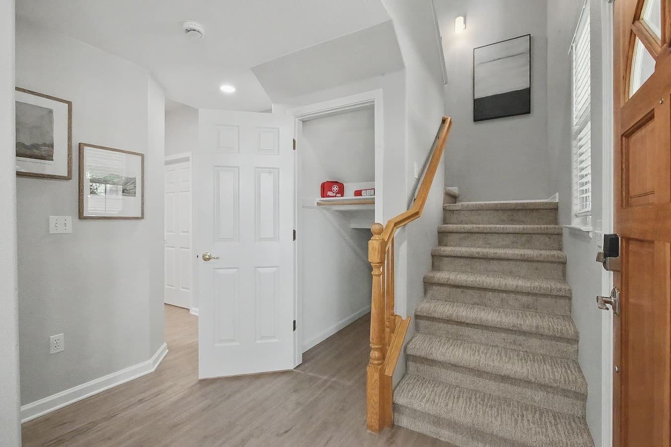 Stairway and hallway area with easy access to the home’s upper level and bedrooms.