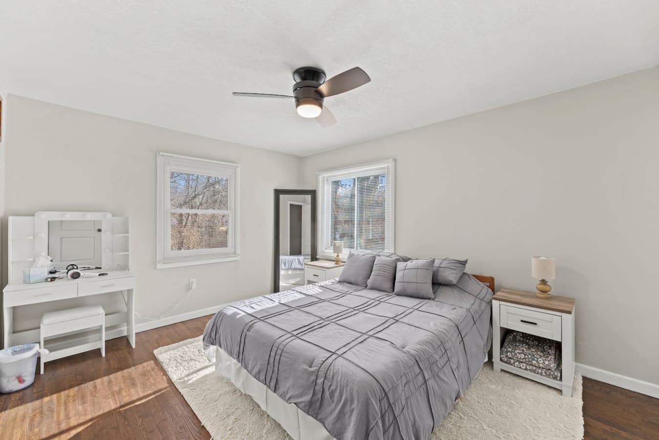 Bright and airy bedroom with comfortable bedding and clean modern style.