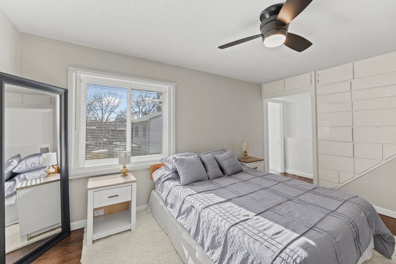 Sunlit bedroom offering a peaceful space to unwind and recharge.
