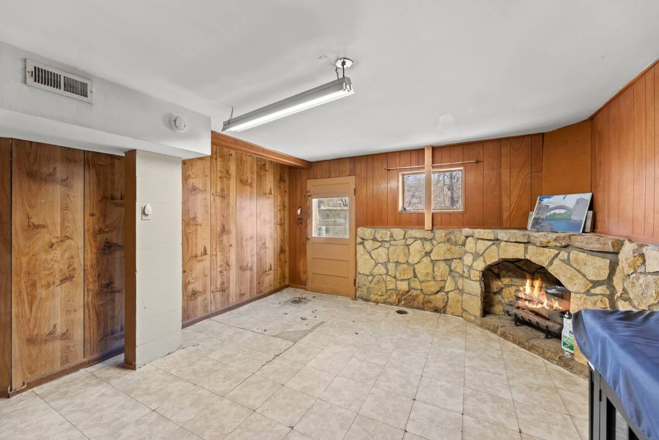 Spacious lower level with rustic charm.