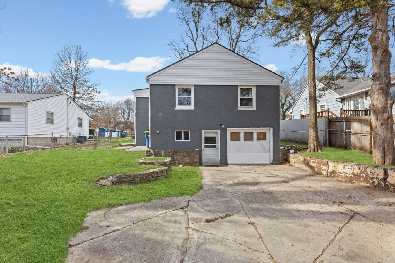 Private driveway and detached garage with easy access to the home.