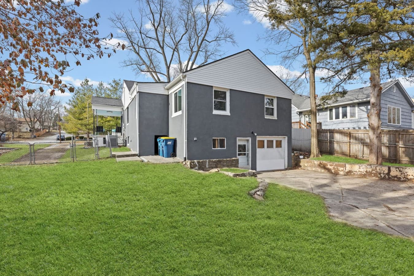 Updated exterior with a spacious yard and charming curb appeal.