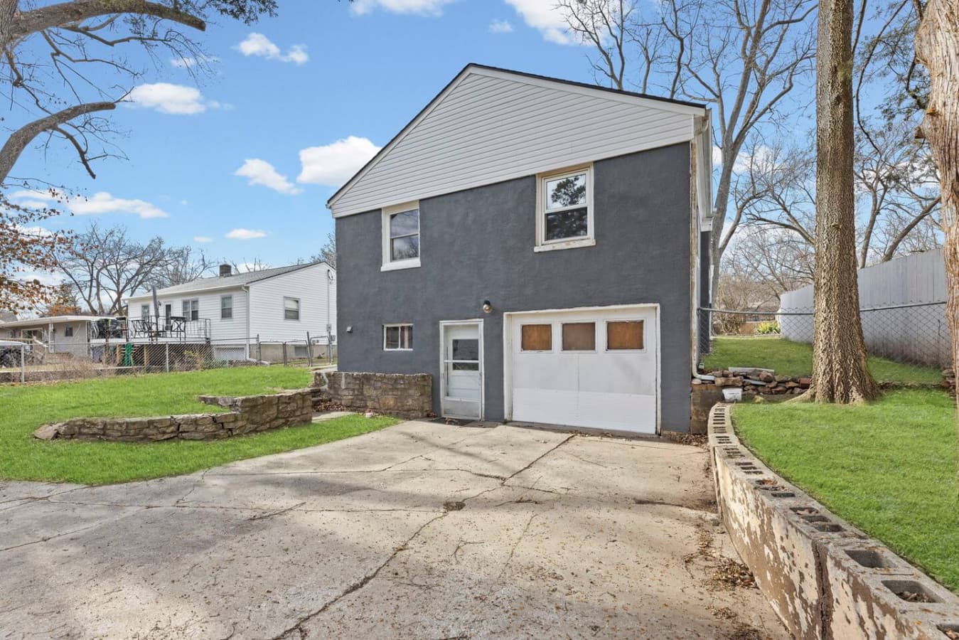 Driveway and garage providing convenient parking and easy access.