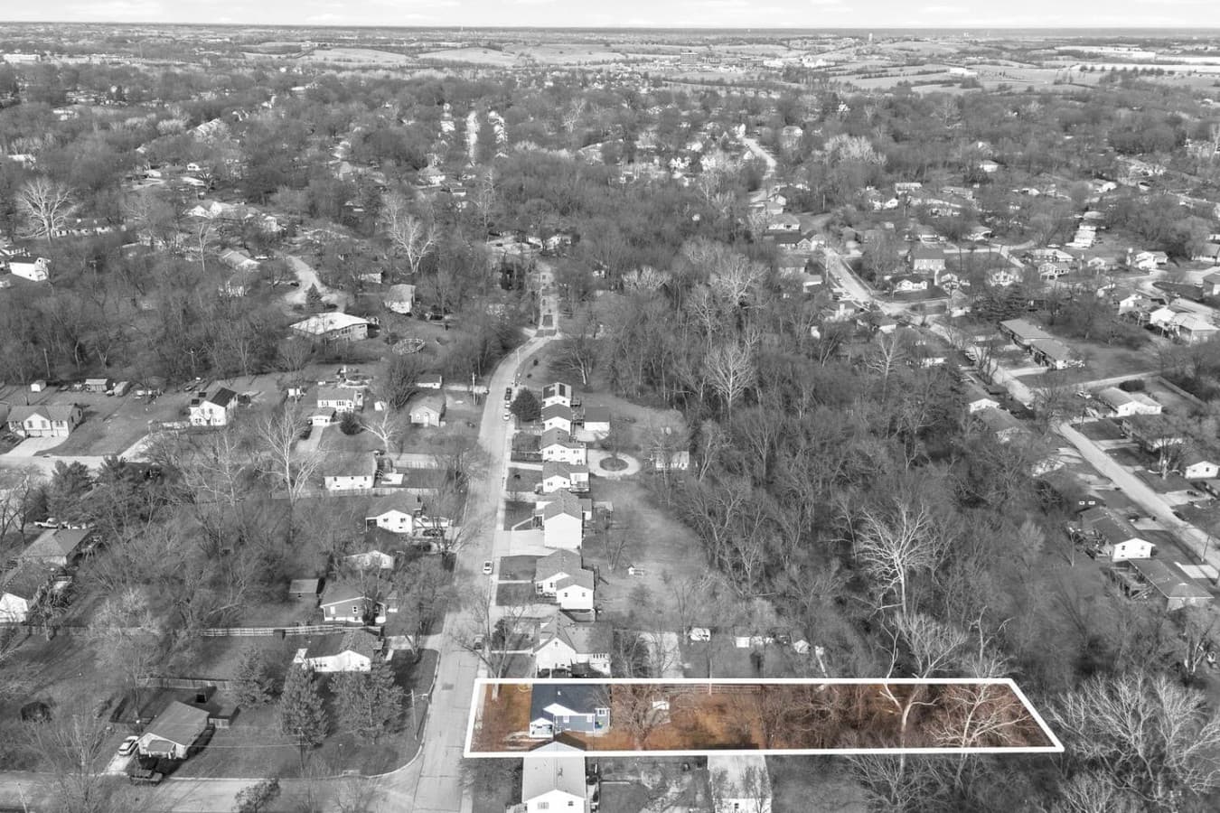 Bird’s eye view showing the property within the neighborhood.