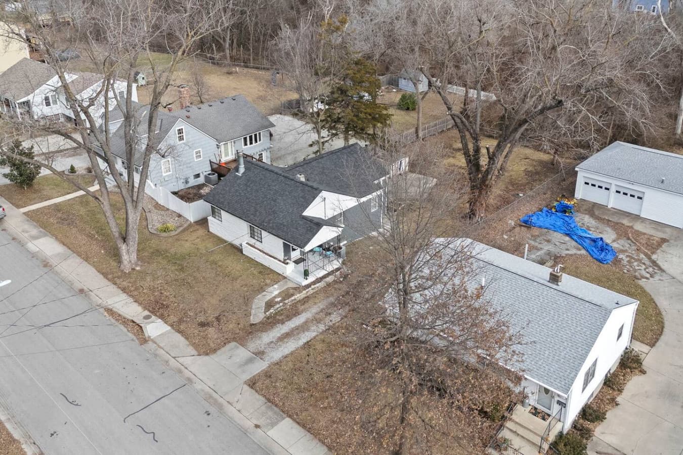 Aerial view showcasing the home’s generous lot and neighborhood layout.