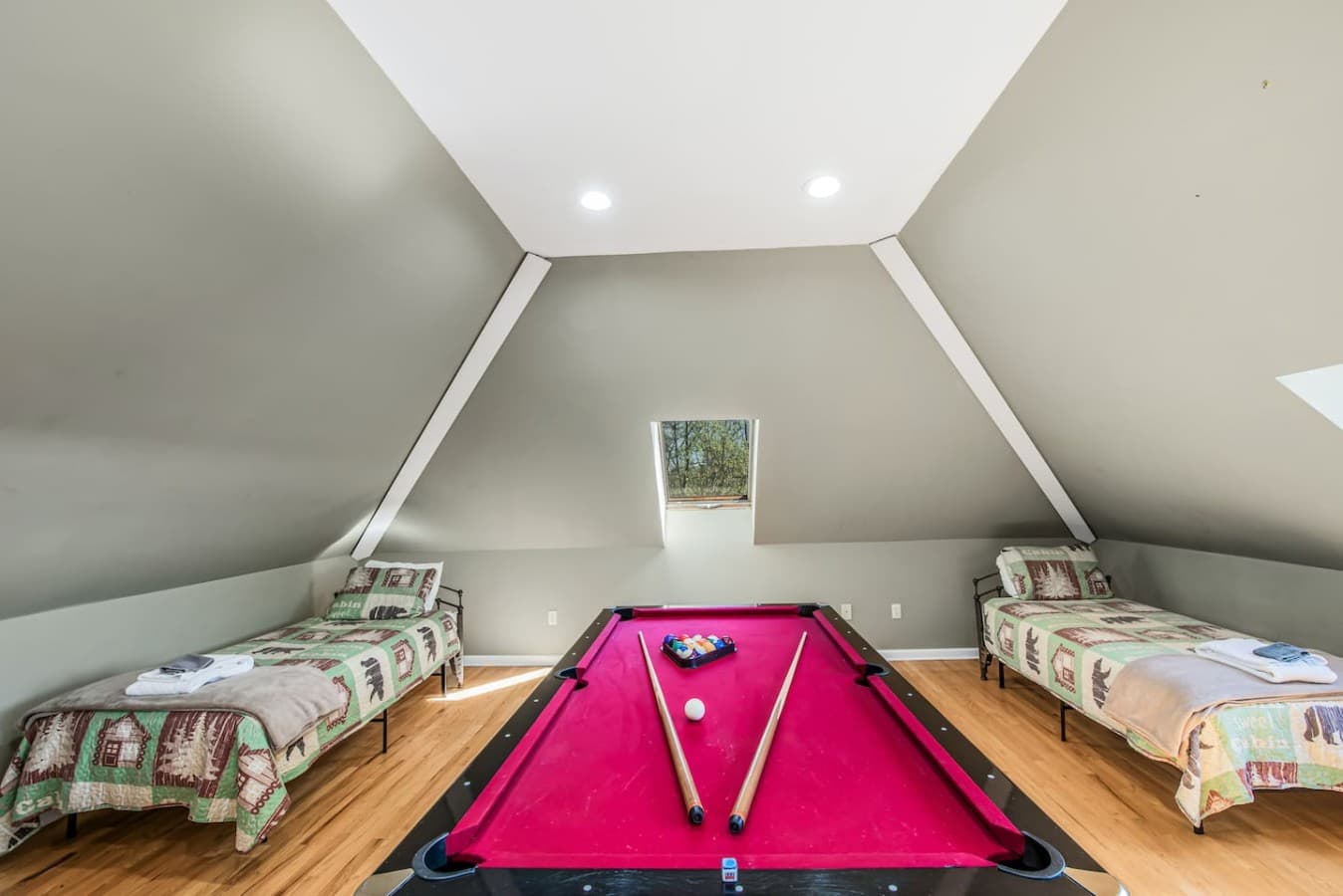 Bright recreational loft with multiple sleeping spaces and fun entertainment for all ages.