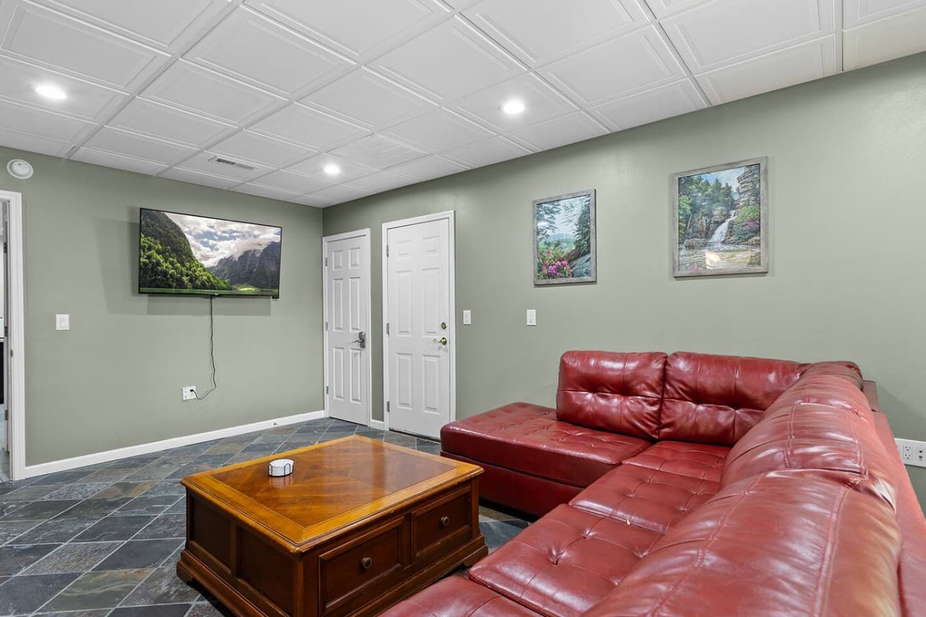 Lower level lounge with oversized sectional seating perfect for movie nights.
