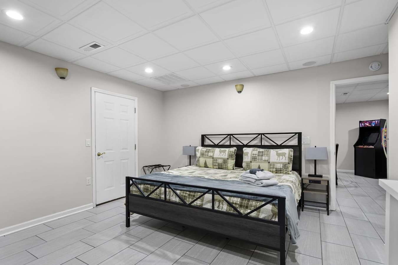 Spacious guest suite with a cozy layout and additional storage space.