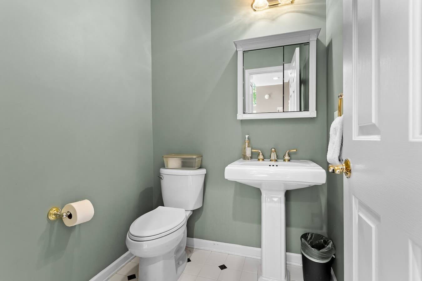 Convenient half bathroom located on the main level of the home.