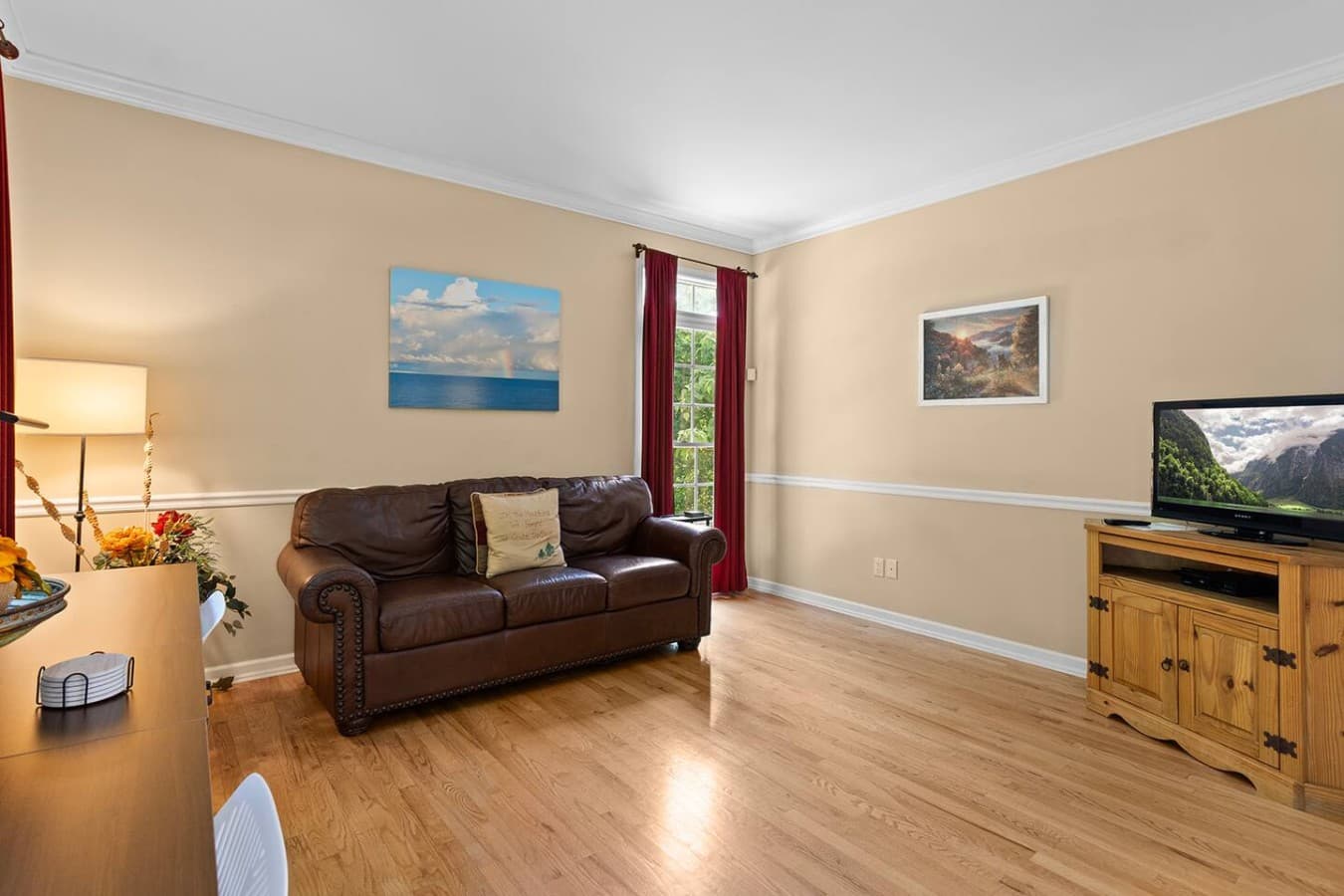 Additional lounge area with cozy seating and plenty of natural light.