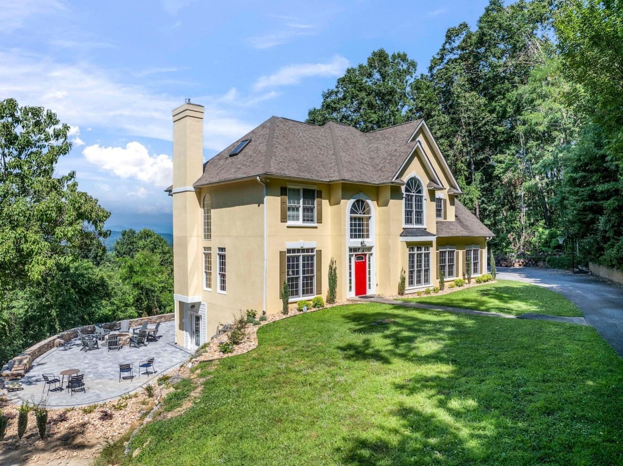 Beautiful mountain home surrounded by peaceful wooded views and expansive outdoor space.