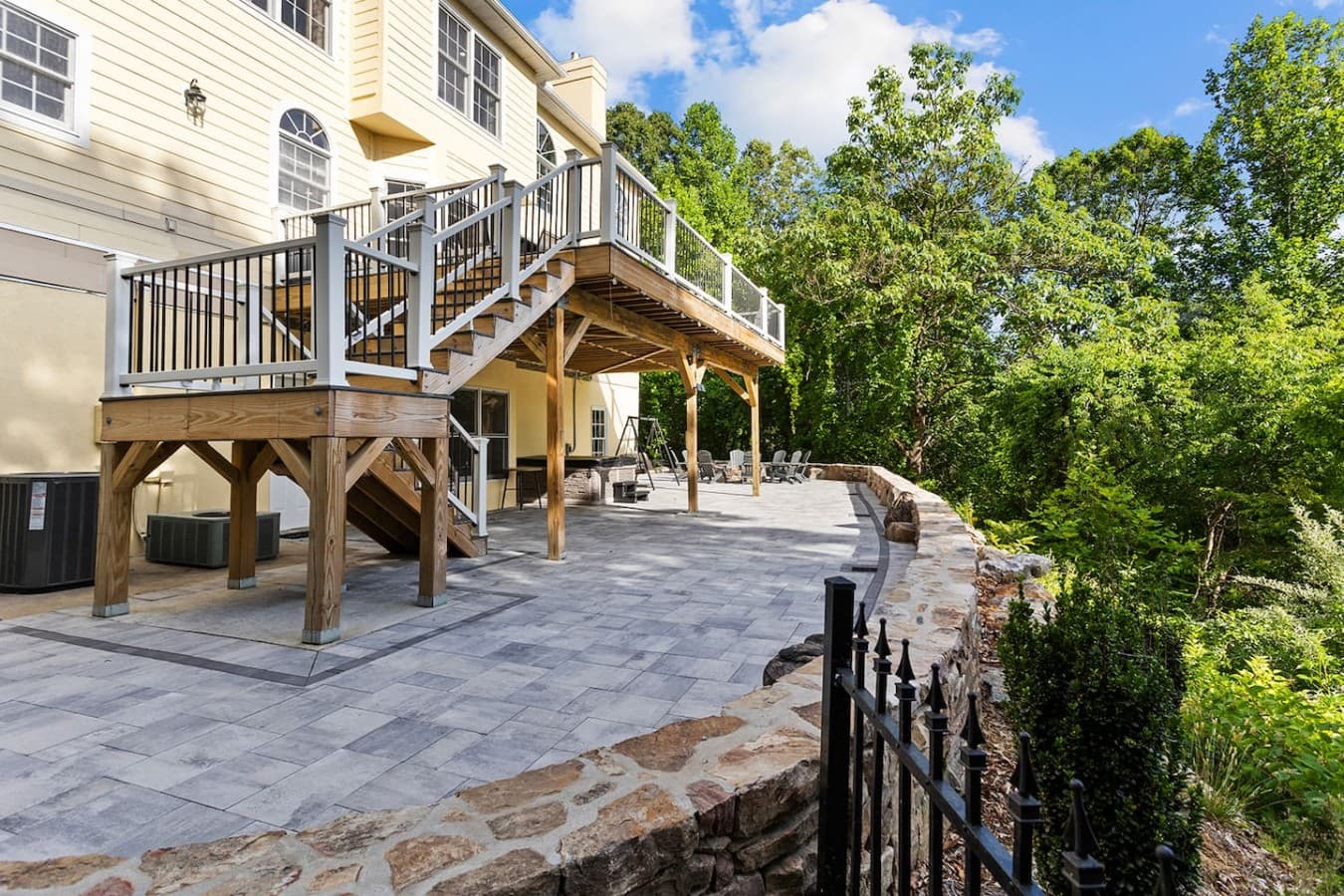 Expansive outdoor patio and deck space perfect for relaxing and entertaining outdoors.
