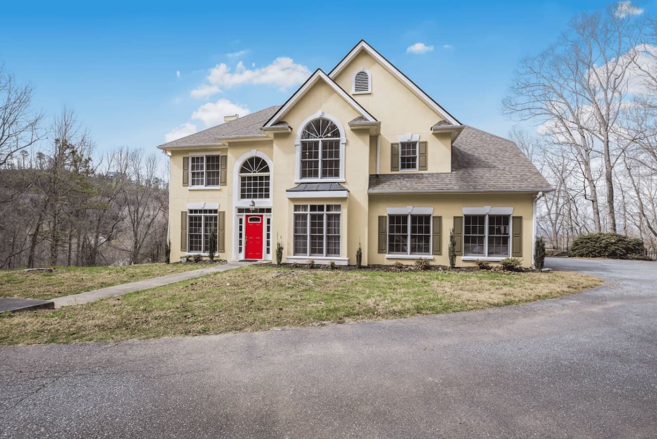 Grand exterior entrance with soaring windows and plenty of space for large groups.