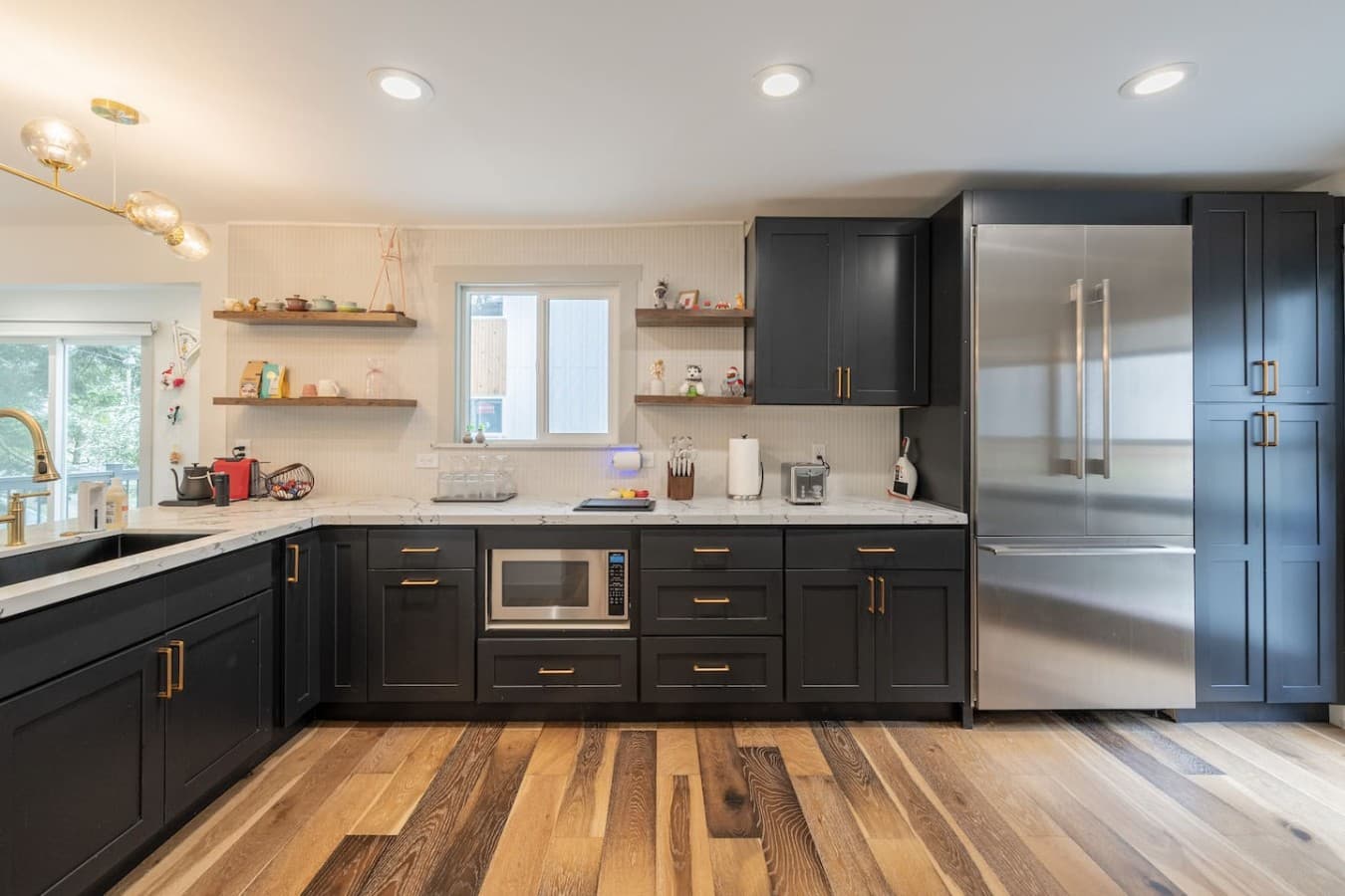 Gourmet Kitchen: Cook up a storm with sleek cabinets, modern appliances, and a charming view!