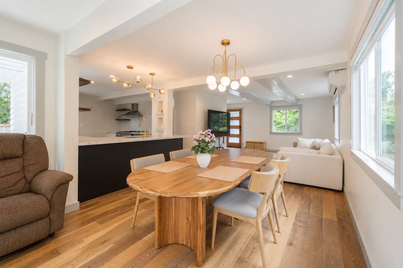 Gourmet Kitchen: Cook up a storm with sleek cabinets, modern appliances, and a charming view!