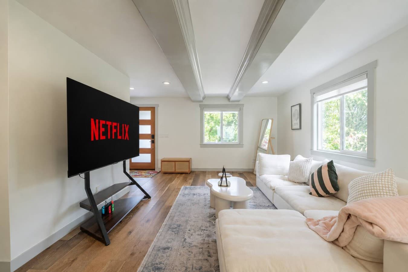 Living Room: Bright and airy space with plush seating, perfect for binge-watching your favorites!