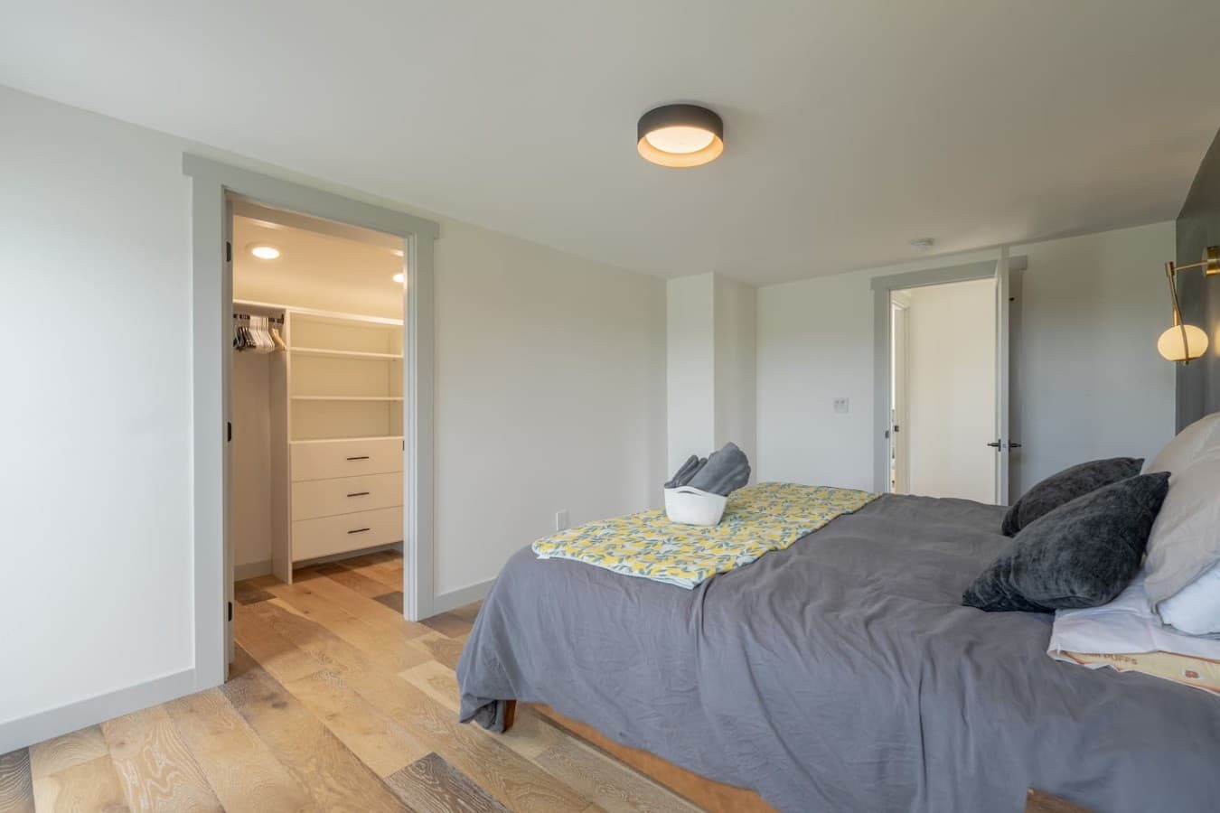 Bright and spacious sleeping area with thoughtful design details and plenty of room to unwind after a long day.