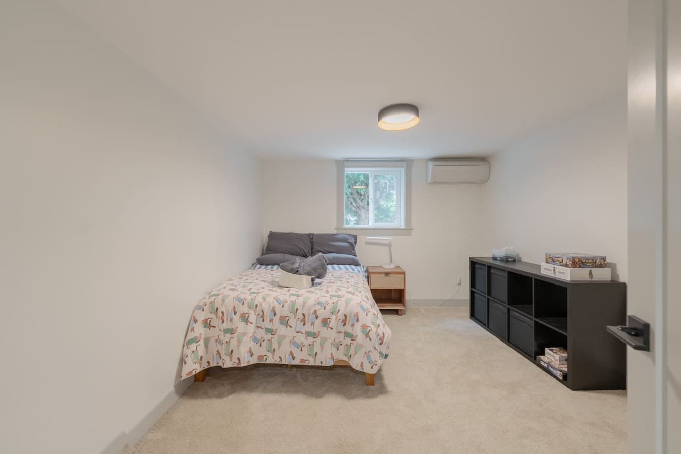 Cozy sleeping space featuring clean modern finishes and plenty of room to settle in and unwind.