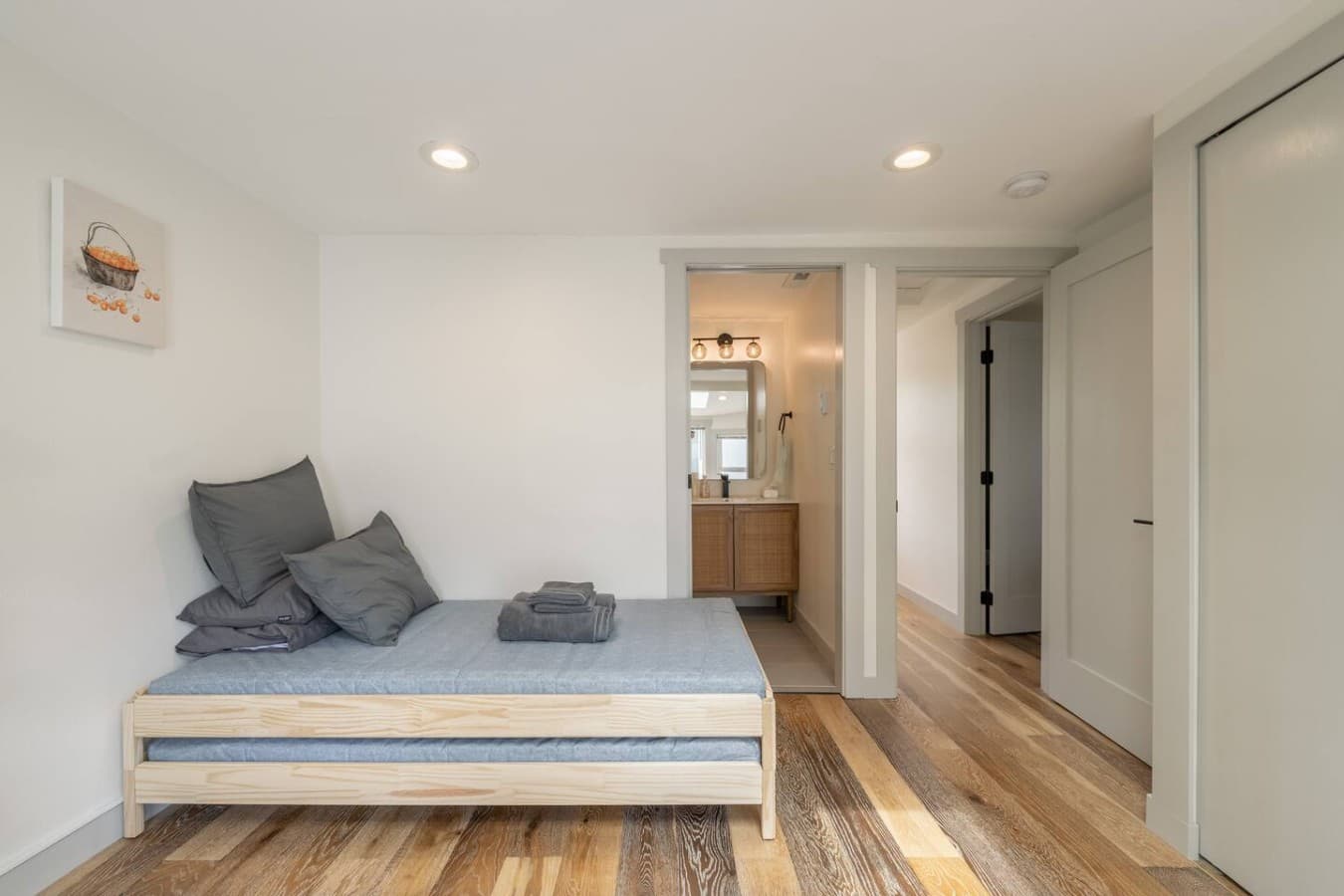 Comfortable sleeping area with clean modern finishes and a calm atmosphere perfect for restful nights.