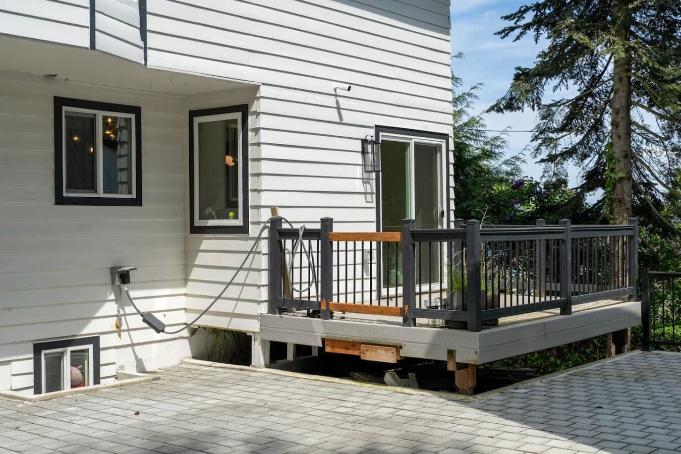 Private outdoor entrance and deck area offering additional space to unwind during your stay.