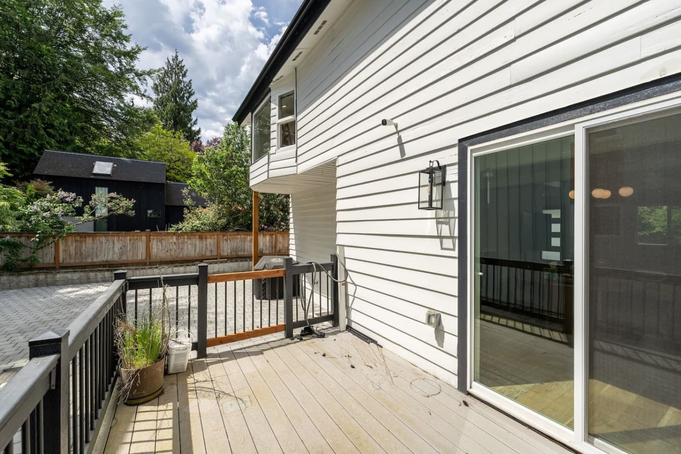 Convenient side patio access with easy indoor outdoor flow for your stay.