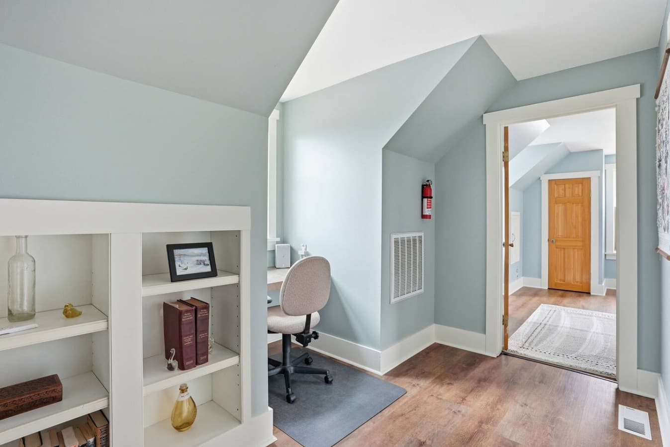 Dedicated workspace tucked into a quiet corner.