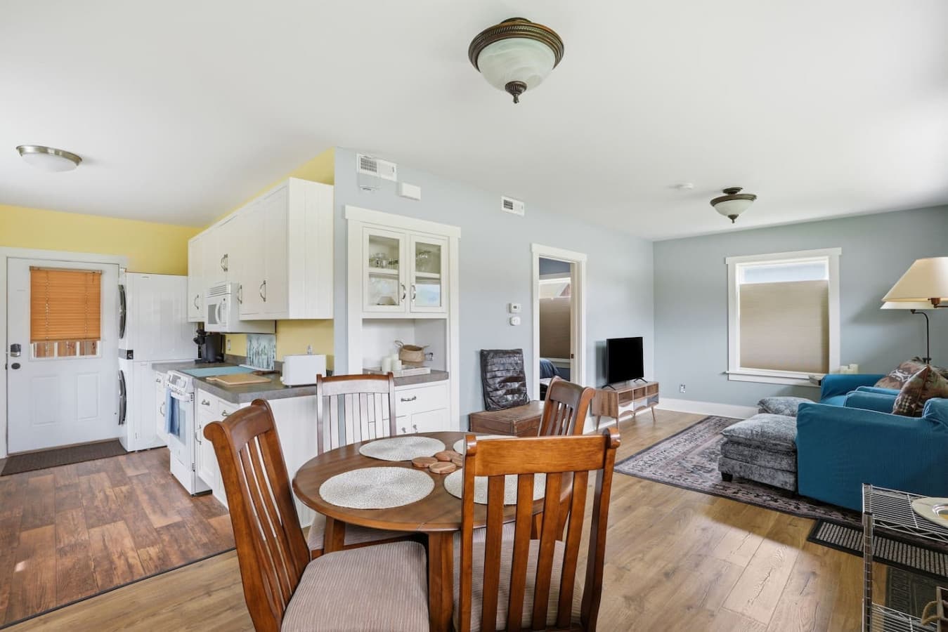 Dining area with comfortable seating and open flow into the living space.