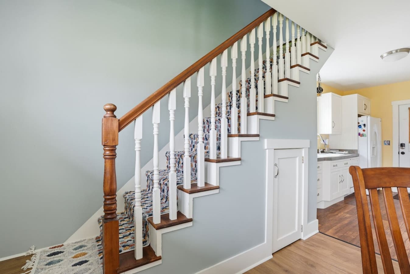 Classic staircase detail adds charm and character to the home.
