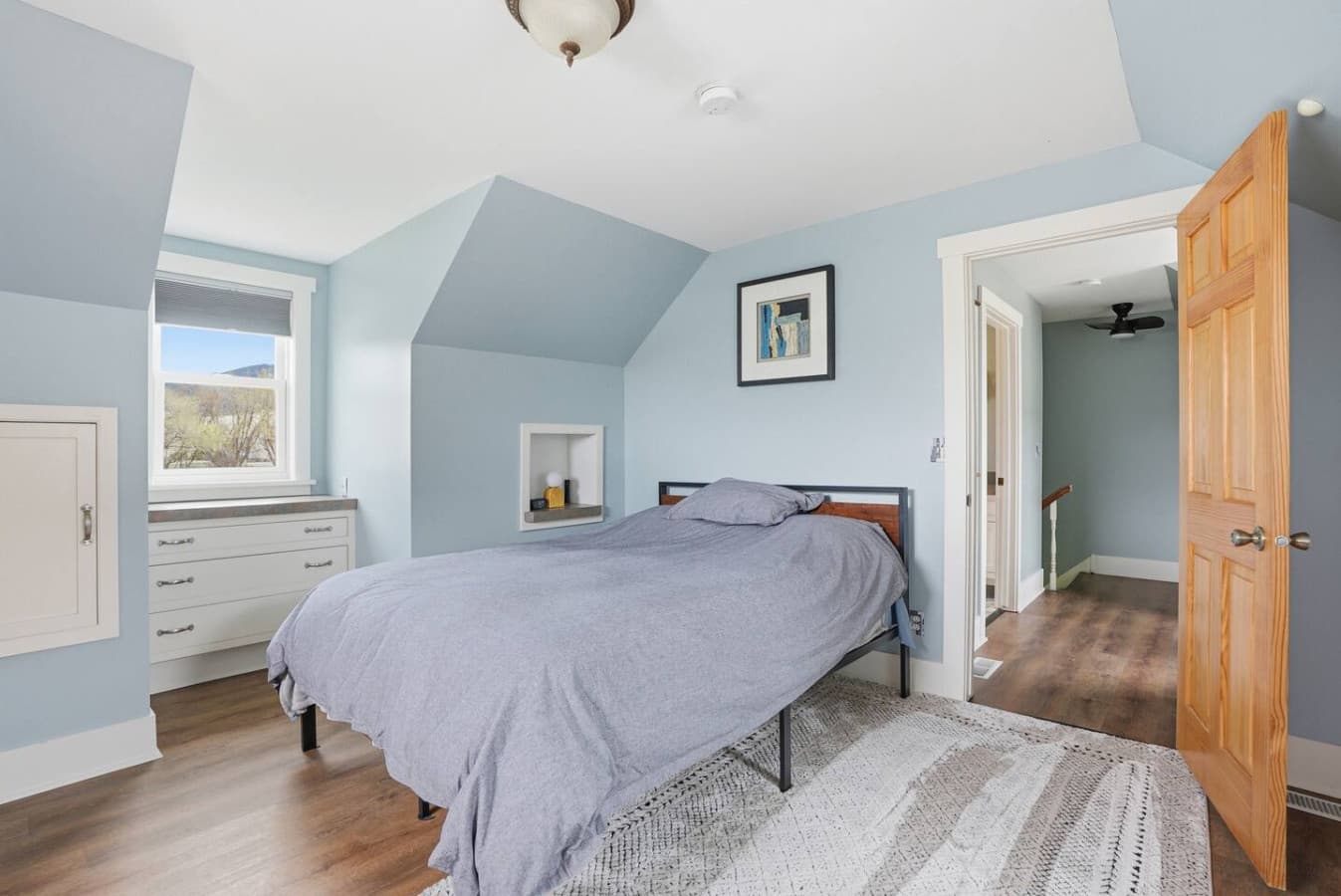 Peaceful bedroom retreat with soft tones and comfortable bedding.