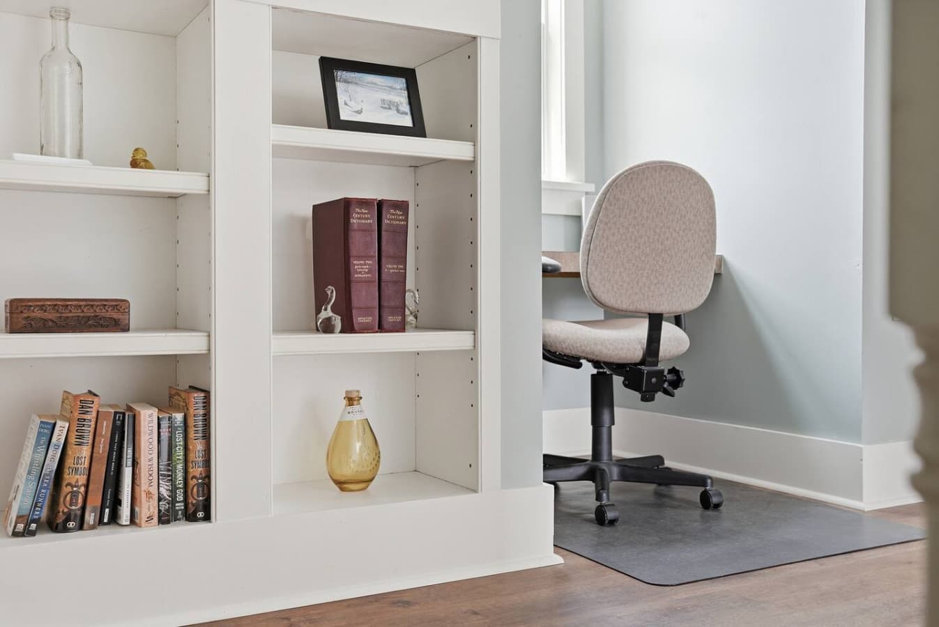 Built in shelving adds charm and functional storage.