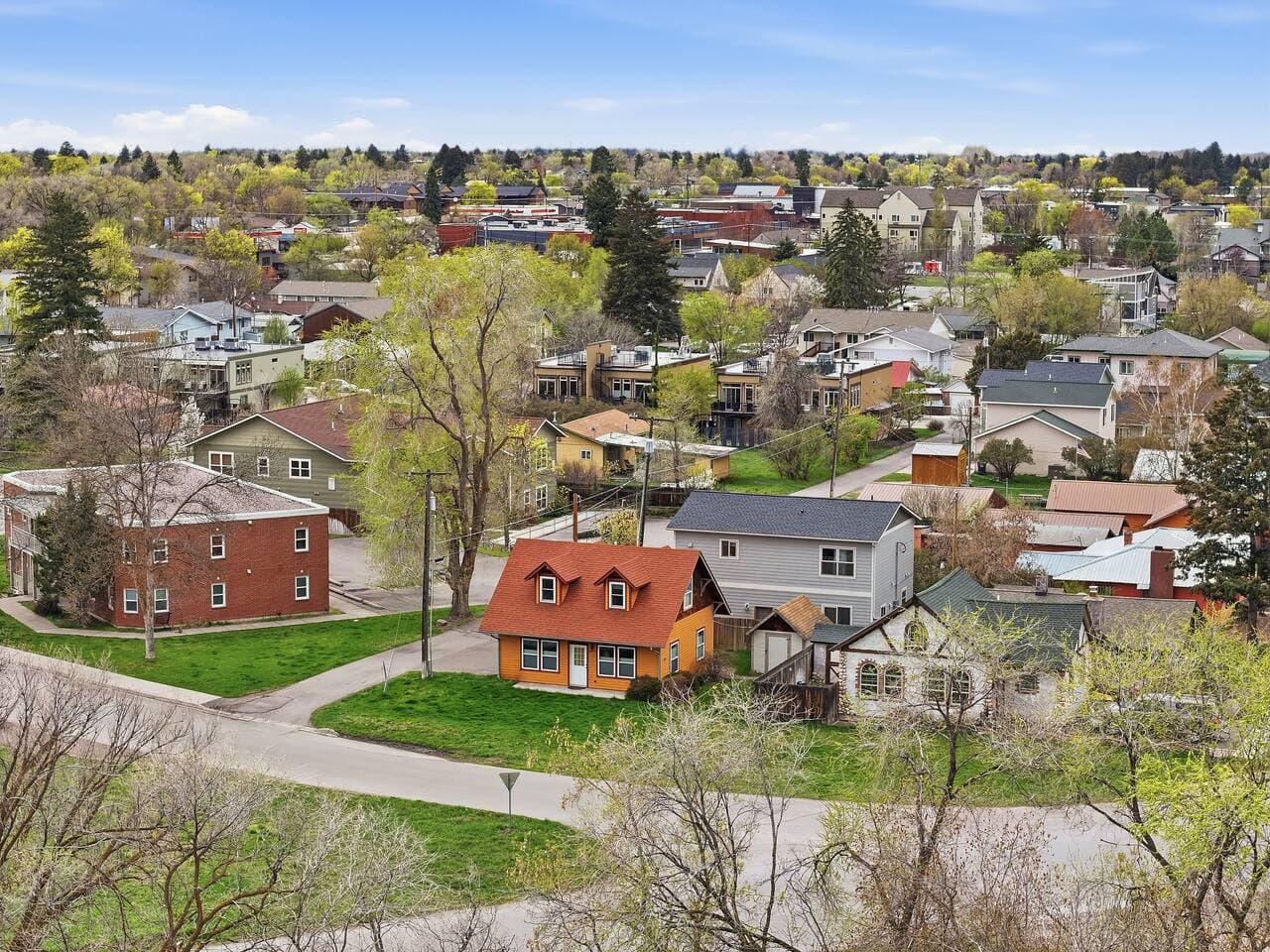 Aerial view showcasing the home within a quiet neighborhood.