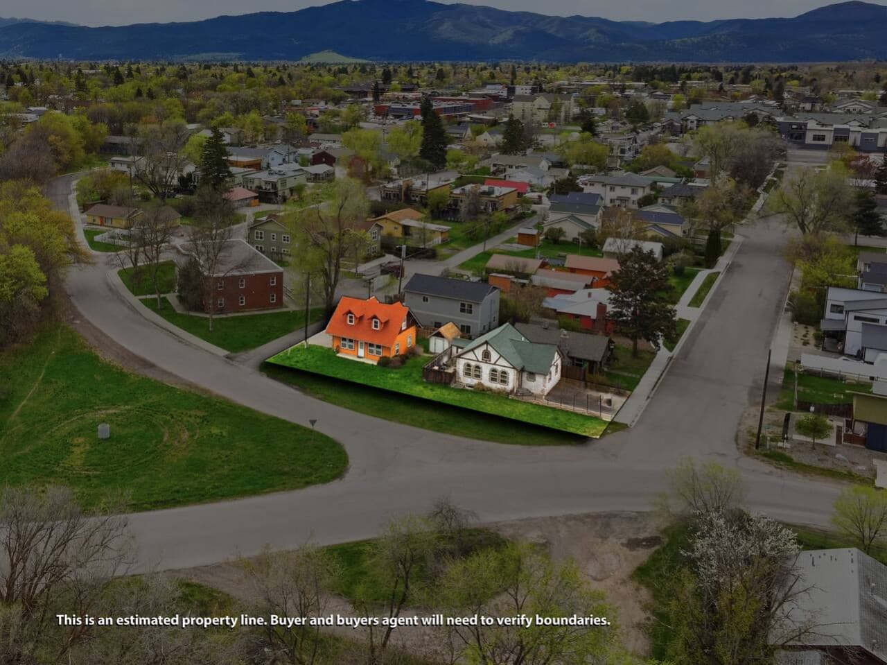 Peaceful residential setting with open green space nearby.