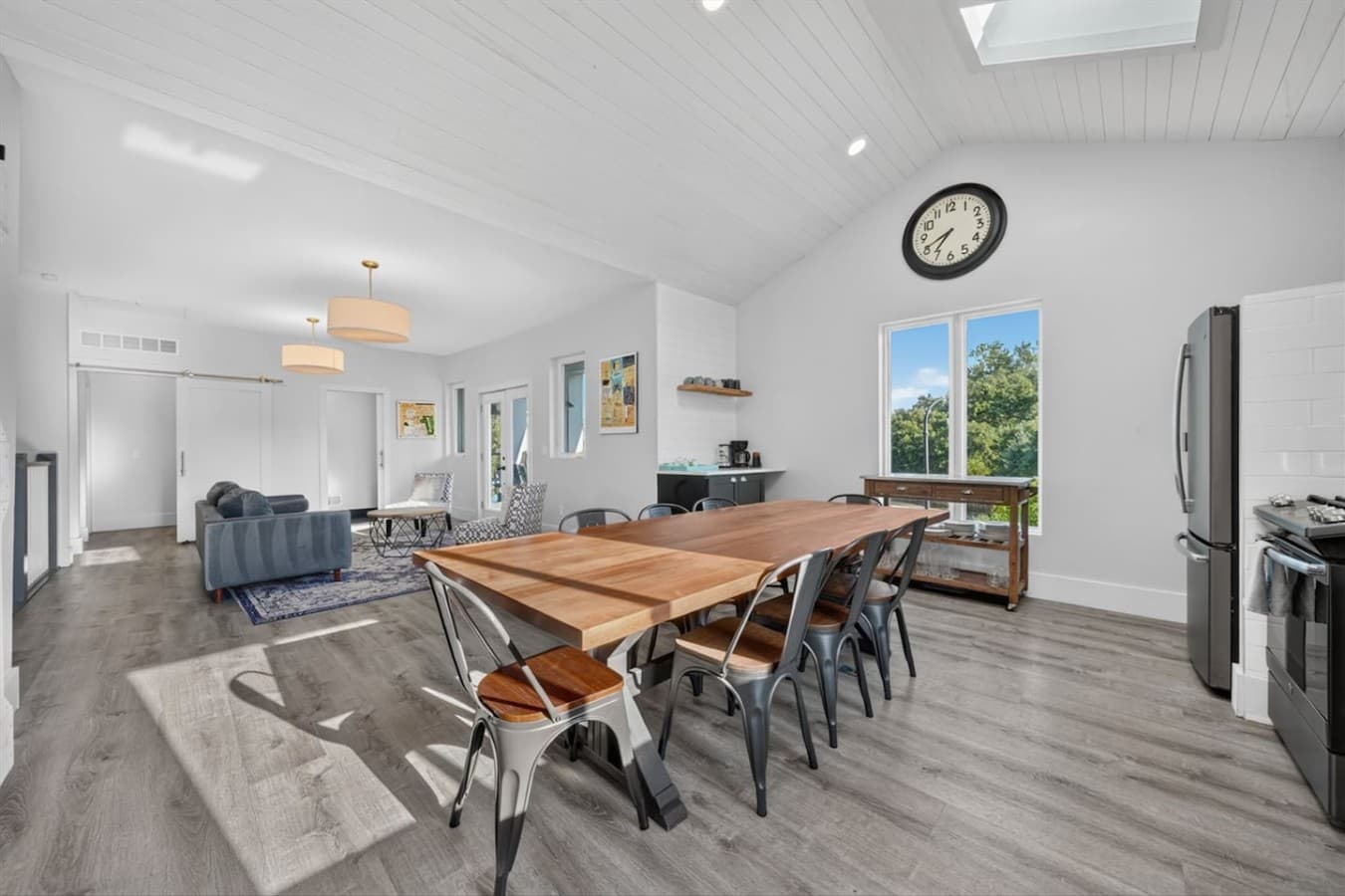 Gather around the oversized dining table for memorable meals and conversations.