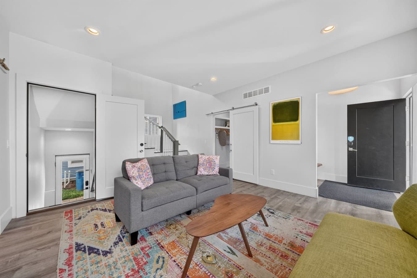 Open-concept living area with easy access to the rest of the home.