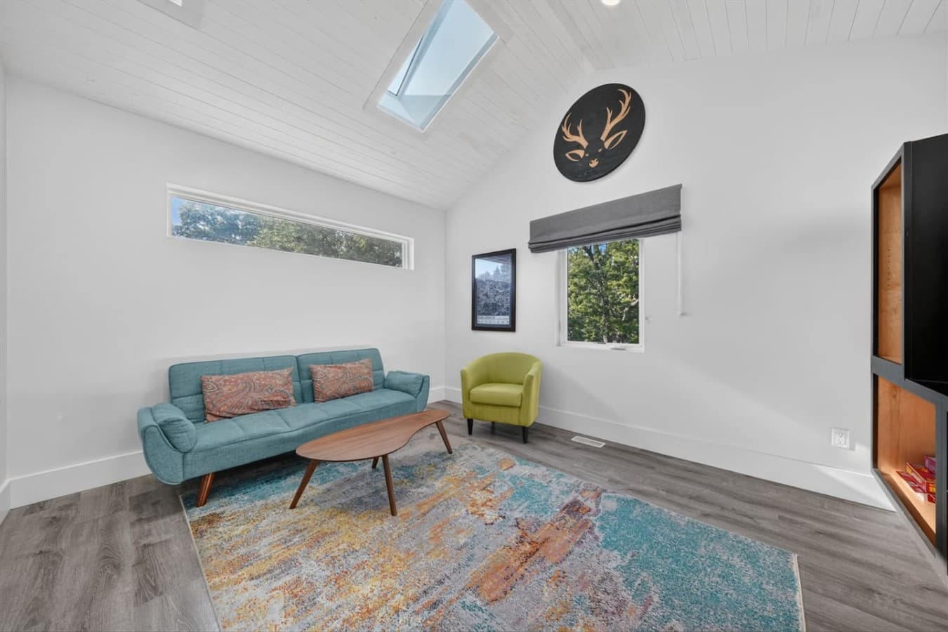 Bright and spacious living room with plenty of natural light.