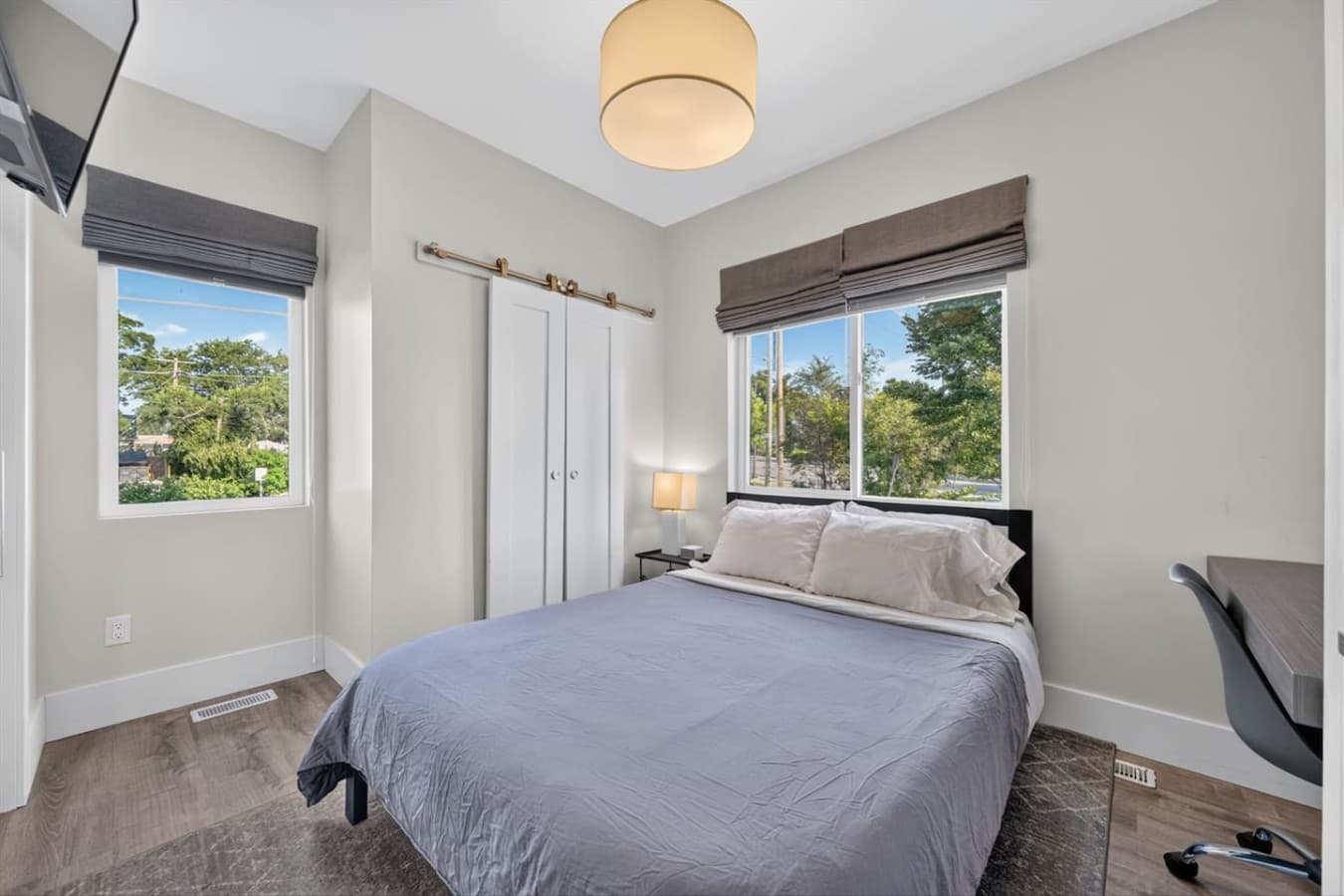 Spacious bedroom with a warm, inviting feel.
