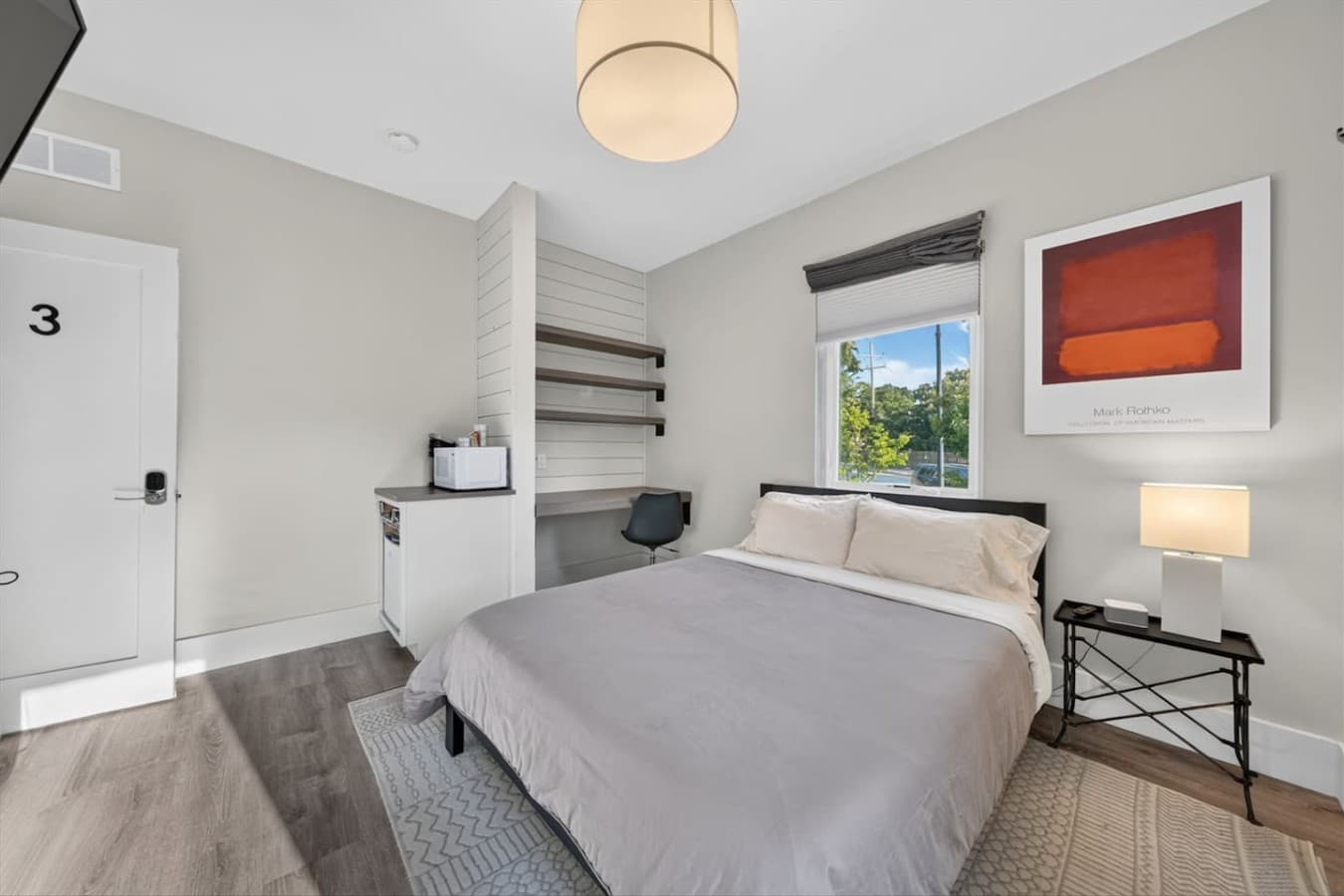 A relaxing guest room offering a comfortable bed, fresh linens, and a quiet space to recharge.