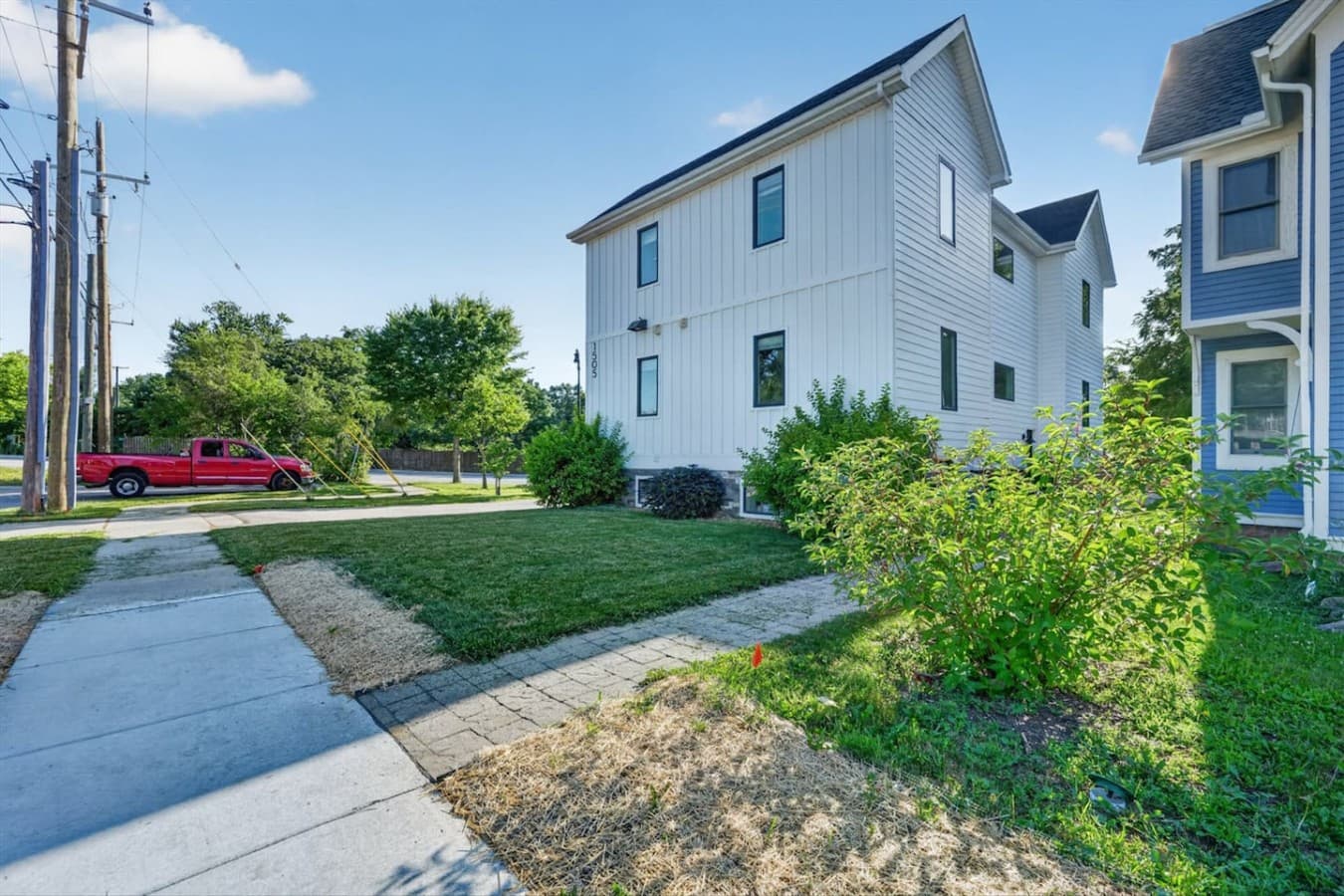 Enjoy additional outdoor space and convenient access from the side of the property.