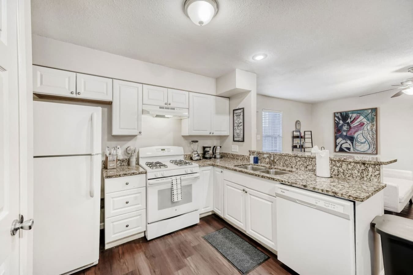 Bright kitchen with full-size appliances.