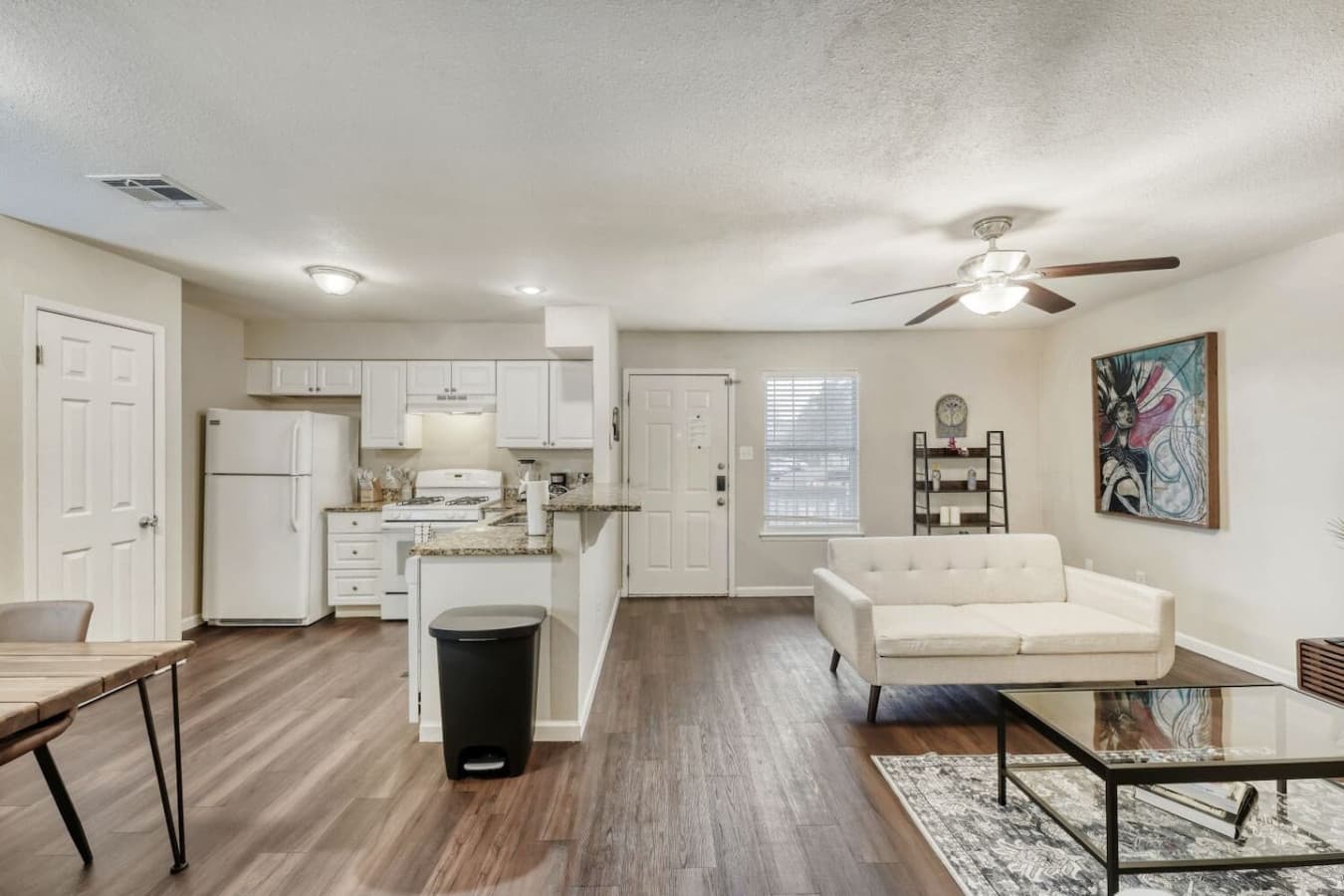 Open living space with kitchen access.
