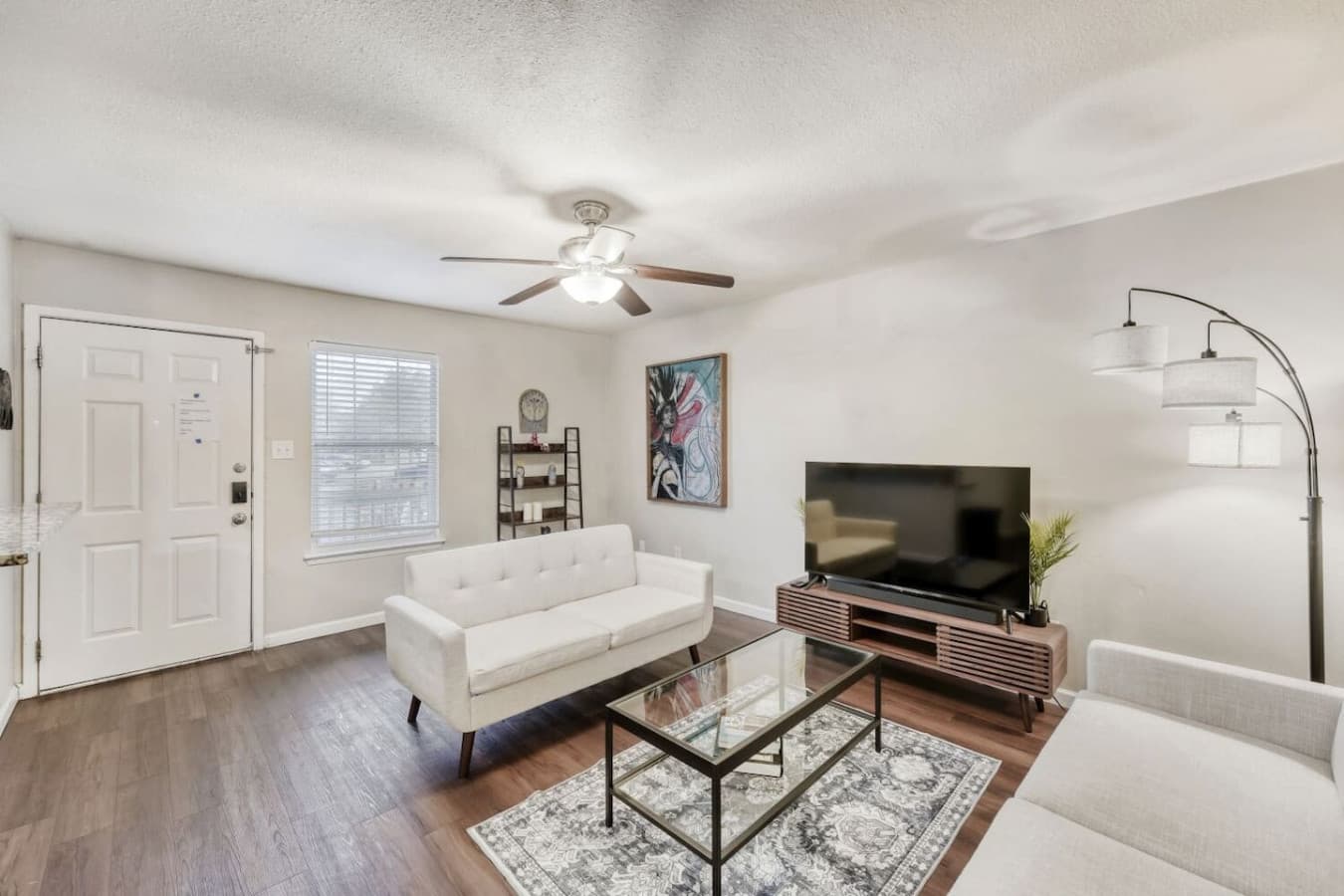 Living area with sofa and coffee table.