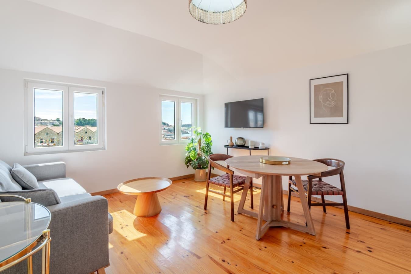 Bright, open living and dining space filled with natural light.