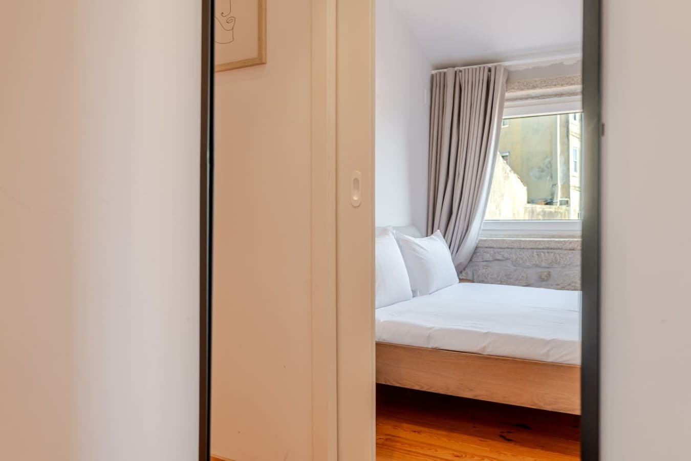 Have a glimpse in this spacious bright bedroom.